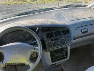 1999 Toyota Sienna LE with VIN 4T3ZF13C5XU141279, listed as a Copart auction lot 64366315 with 218,223 mi miles and Clean title. Bid and sale history available at DreamBid. Image 9.