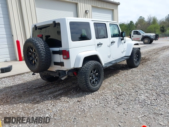 2017 Jeep Wrangler Unlimited Sahara with VIN 1C4BJWEG8HL734572, listed as a IAAI auction lot 41863636 with 123,979 mi miles. Bid and sale history available at carsss.com. Image 4.