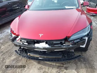 2025 Tesla Model 3 Long Range with VIN 5YJ3E1EB7SF890659, listed as a IAAI auction lot 41550353 with 1,004 mi miles and . Bid and sale history available at DreamBid. Image 6.