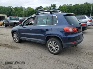 2011 Volkswagen Tiguan SEL z VIN WVGBV7AX2BW534482, wystawiony jako Copart lot #61097265 z przebiegiem 186 282 mil mil oraz Czysty tytuł • Clean title. Historia ofert i sprzedaży dostępna na DreamBid. Obrazek 2.