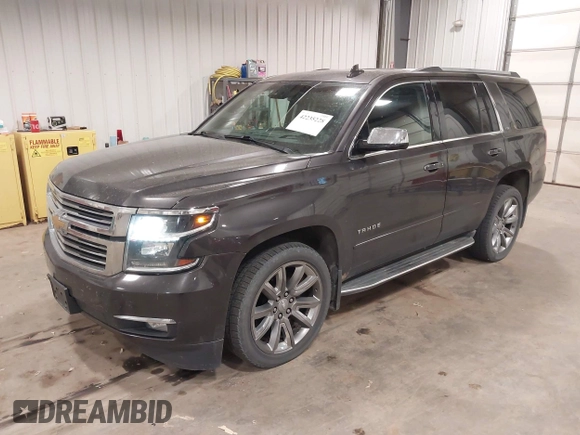 2016 Chevrolet Tahoe LTZ with VIN 1GNSKCKC1GR201155, listed as a IAAI auction lot 42235228 with 184,585 mi miles and . Bid and sale history available at DreamBid. Image 2.