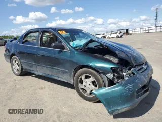 2001 Honda Accord LX z VIN JHMCG66501C014025, wystawiony jako Copart lot #51326805 z przebiegiem Nie podano mil oraz Szkoda całkowita • Salvage title. Historia ofert i sprzedaży dostępna na DreamBid. Obrazek 4.