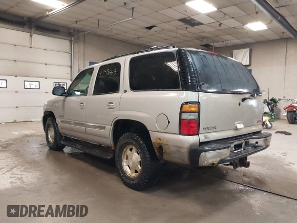 2004 GMC Yukon SLT with VIN 1GKEK13TX4J155865, listed as a IAAI auction lot 41758663 with 281,531 mi miles. Bid and sale history available at carsss.com. Image 3.