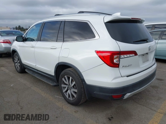 2020 Honda Pilot EX-L with VIN 5FNYF5H57LB003059, listed as a IAAI auction lot 41685916 with 114,742 mi miles. Bid and sale history available at carsss.com. Image 3.