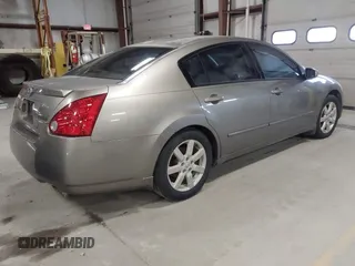 2004 Nissan Maxima SE with VIN 1N4BA41E64C911306, listed as a IAAI auction lot 41901758 with 160,841 mi miles and . Bid and sale history available at DreamBid. Image 4.