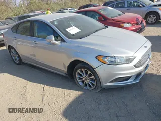 2017 Ford Fusion SE z VIN 3FA6P0H73HR236618, wystawiony jako IAAI lot #40734739 z przebiegiem 189 000 mil mil oraz . Historia ofert i sprzedaży dostępna na DreamBid. Obrazek 1.