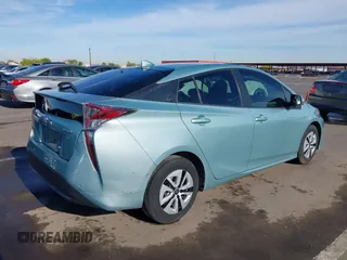 2018 Toyota Prius Two with VIN JTDKBRFUXJ3066430, listed as a IAAI auction lot 42034812 with 119,711 mi miles and . Bid and sale history available at carsss.com. Image 4.