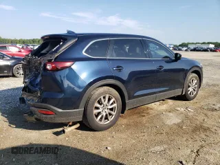 2017 Mazda CX-9 Touring with VIN JM3TCACY7H0140268, listed as a Copart auction lot 60982885 with 157,656 mi miles and Salvage title. Bid and sale history available at DreamBid. Image 3.