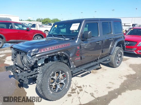 2020 Jeep Wrangler Unlimited Rubicon z VIN 1C4HJXFN0LW300344, wystawiony jako IAAI lot #41943662 z przebiegiem 59 051 mil mil oraz . Historia ofert i sprzedaży dostępna na DreamBid. Obrazek 19.