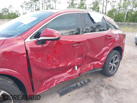 2024 Lexus RX 350h with VIN 2T2BBMCA8RC036659, listed as a IAAI auction lot 42619124 with 19,821 mi miles and . Bid and sale history available at DreamBid. Image 6.