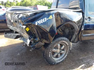 2013 Nissan Titan Pro-4X with VIN 1N6BA0EC4DN305032, listed as a IAAI auction lot 42341681 with 118,251 mi miles and . Bid and sale history available at DreamBid. Image 6.