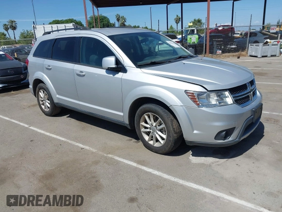 2014 Dodge Journey SXT z VIN 3C4PDDBG8ET212188, wystawiony jako IAAI lot #42101266 z przebiegiem 101 553 mil mil oraz . Historia ofert i sprzedaży dostępna na DreamBid. Obrazek 1.