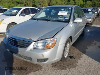 2009 Kia Spectra EX with VIN KNAFE221795620189, listed as a IAAI auction lot 41946984 with 131,913 mi miles. Bid and sale history available at carsss.com. Image 2.