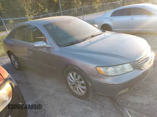 2006 Hyundai Azera SE with VIN KMHFC46F16A109232, listed as a IAAI auction lot 40932728 with 210,300 mi miles and . Bid and sale history available at DreamBid. Image 1.