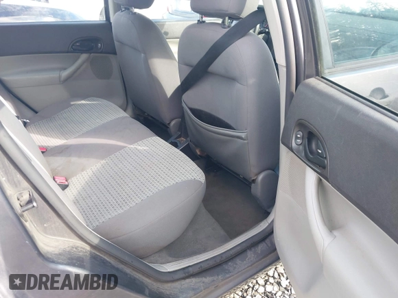 2006 Ford Focus S z VIN 1FAFP34NX6W179320, wystawiony jako IAAI lot #41937794 z przebiegiem 211 961 mil mil oraz . Historia ofert i sprzedaży dostępna na DreamBid. Obrazek 8.