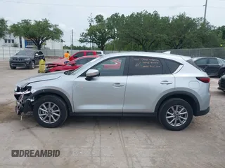 2023 Mazda CX-5 S Carbon Edition z VIN JM3KFBCM3P0197796, wystawiony jako IAAI lot #42408301 z przebiegiem 46 169 mil mil oraz . Historia ofert i sprzedaży dostępna na DreamBid. Obrazek 14.
