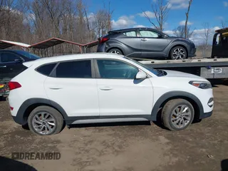 2017 Hyundai Tucson SE with VIN KM8J3CA40HU403622, listed as a IAAI auction lot 41698388 with 98,620 mi miles. Bid and sale history available at carsss.com. Image 13.