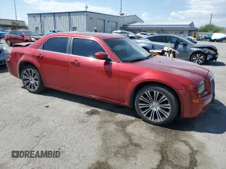 2010 Chrysler 300 with VIN 2C3CA2CV4AH330352, listed as a Copart auction lot 70720414 with 164,673 mi miles and Salvage Title. Bid and sale history available at carsss.com. Image 4.