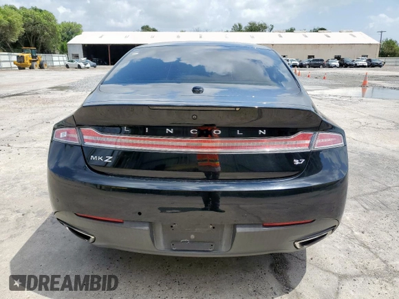 2016 Lincoln MKZ с VIN 3LN6L2GK2GR634663, выставлен на аукционе Copart как лот 60858995 с пробегом 105 474 миль миль и Списание • Salvage title. История ставок и продаж доступна на DreamBid. Изображение 6.