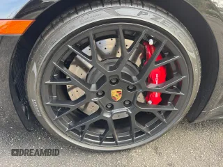 2022 Porsche 911 Carrera S z VIN WP0CB2A90NS244999, wystawiony jako Copart lot #56801295 z przebiegiem 1735 mil mil oraz Nie do naprawy. Historia ofert i sprzedaży dostępna na DreamBid. Obrazek 6.