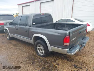 2004 Dodge Dakota SLT with VIN 1D7HL48N34S750719, listed as a IAAI auction lot 41135108 with 1 mi miles. Bid and sale history available at carsss.com. Image 3.