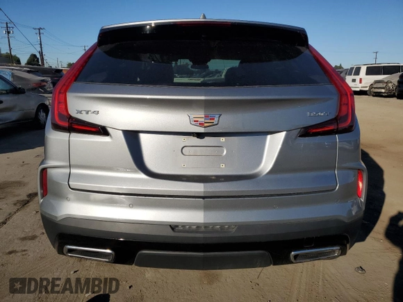 2024 Cadillac XT4 FWD Premium Luxury z VIN 1GYFZCR47RF126643, wystawiony jako Copart lot #50268745 z przebiegiem 24 583 mil mil oraz Czysty tytuł • Clean title. Historia ofert i sprzedaży dostępna na DreamBid. Obrazek 6.