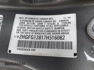 2007 Honda Civic Cpe EX with VIN 2HGFG12817H516082, listed as a IAAI auction lot 42142797 with 170,442 mi miles. Bid and sale history available at carsss.com. Image 9.
