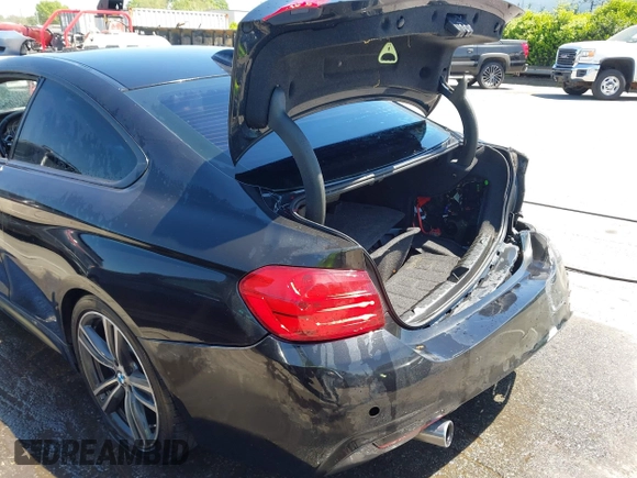 2015 BMW 4 Series 435i with VIN WBA3R1C56FK194060, listed as a IAAI auction lot 42061619 with 153,384 mi miles and . Bid and sale history available at DreamBid. Image 18.