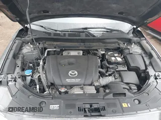 2017 Mazda CX-5 Touring with VIN JM3KFACL3H0148312, listed as a IAAI auction lot 41844634 with 68,534 mi miles and . Bid and sale history available at carsss.com. Image 10.