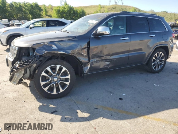 2017 Jeep Grand Cherokee Overland with VIN 1C4RJFCG9HC601806, listed as a Copart auction lot 61786275 with 122,898 mi miles and Salvage title. Bid and sale history available at DreamBid. Image 1.