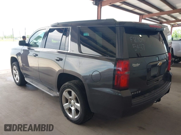 2015 Chevrolet Tahoe LT with VIN 1GNSCBKC5FR105437, listed as a IAAI auction lot 42052084 with 348,093 mi miles and . Bid and sale history available at DreamBid. Image 3.