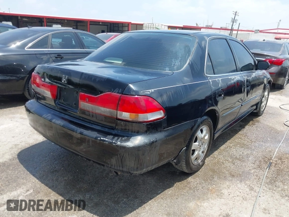 2002 Honda Accord EX z VIN 1HGCG56642A144814, wystawiony jako IAAI lot #42332217 z przebiegiem 250 835 mil mil oraz . Historia ofert i sprzedaży dostępna na DreamBid. Obrazek 4.
