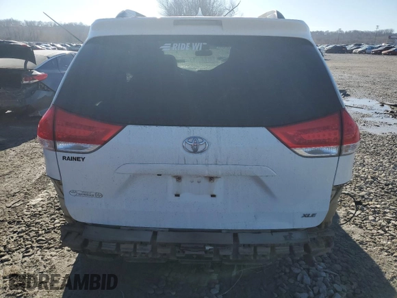 2012 Toyota Sienna XLE AAS with VIN 5TDYK3DC2CS243832, listed as a Copart auction lot 46677115 with 253,252 mi miles and Salvage Title. Bid and sale history available at DreamBid. Image 6.