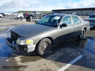 1999 Ford Crown Victoria Police Pkg with VIN 2FAFP71W9XX187581, listed as a IAAI auction lot 41522223 with 94,889 mi miles. Bid and sale history available at carsss.com. Image 17.
