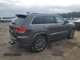 2017 Jeep Grand Cherokee Overland with VIN 1C4RJECG2HC903366, listed as a Copart auction lot 44140155 with 102,459 mi miles and Salvage title. Bid and sale history available at DreamBid. Image 3.