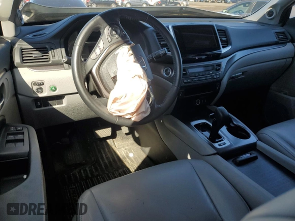 2017 Honda Pilot EX-L with VIN 5FNYF6H54HB103603, listed as a Copart auction lot 52052785 with 117,742 mi miles and Salvage Title. Bid and sale history available at DreamBid. Image 8.