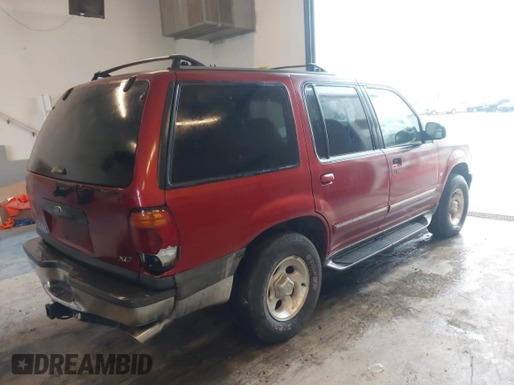 2000 Ford Explorer XLT z VIN 1FMZU83P1YZC54998, wystawiony jako IAAI lot #41613856 z przebiegiem 225 855 mil mil oraz . Historia ofert i sprzedaży dostępna na DreamBid. Obrazek 4.
