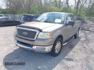 2004 Ford F-150 XL with VIN 1FTPX12584NA58780, listed as a IAAI auction lot 42123687 with 160,672 mi miles. Bid and sale history available at carsss.com. Image 2.
