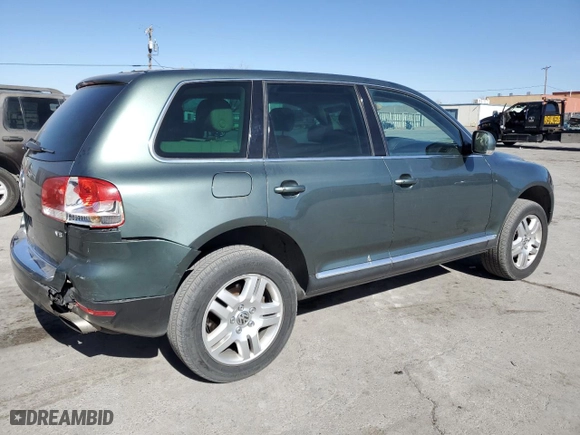 2004 Volkswagen Touareg with VIN WVGEM77L64D059129, listed as a Copart auction lot 42701525 with 0 mi miles and Salvage Title. Bid and sale history available at carsss.com. Image 3.