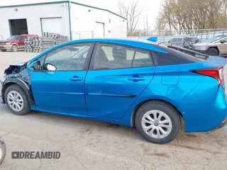 2021 Toyota Prius L Eco with VIN JTDKAMFU5M3145949, listed as a IAAI auction lot 42113123 with 127,872 mi miles and . Bid and sale history available at DreamBid. Image 14.