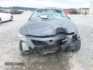 2009 Toyota Camry LE z VIN 4T1BK46KX9U594987, wystawiony jako IAAI lot #42039029 z przebiegiem 156 812 mil mil oraz . Historia ofert i sprzedaży dostępna na DreamBid. Obrazek 13.