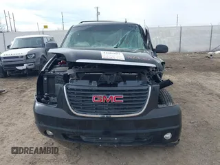 2011 GMC Yukon SLT with VIN 1GKS2CE02BR365229, listed as a IAAI auction lot 41601082 with 203,739 mi miles. Bid and sale history available at carsss.com. Image 12.