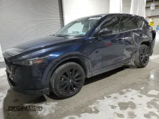 2022 Mazda CX-5 2.5 Turbo with VIN JM3KFBAY1N0636626, listed as a Copart auction lot 52257685 with 41,329 mi miles and Salvage Title. Bid and sale history available at carsss.com. Image 1.