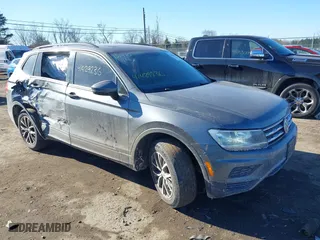 2019 Volkswagen Tiguan SE with VIN 3VV2B7AX4KM013634, listed as a IAAI auction lot 41429236 with 133,492 mi miles. Bid and sale history available at carsss.com. Image 1.