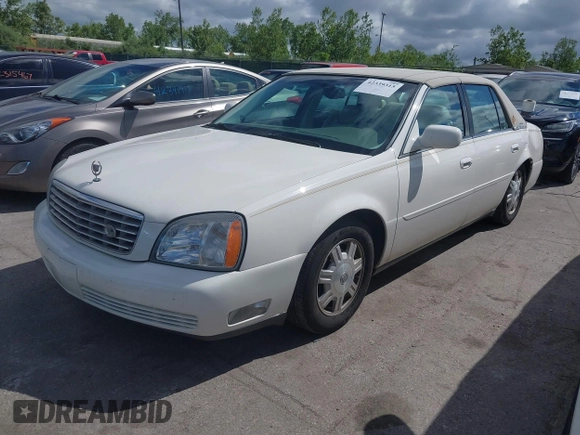2003 Cadillac DeVille z VIN 1G6KD54Y23U221187, wystawiony jako IAAI lot #42339315 z przebiegiem 82 681 mil mil oraz . Historia ofert i sprzedaży dostępna na DreamBid. Obrazek 2.