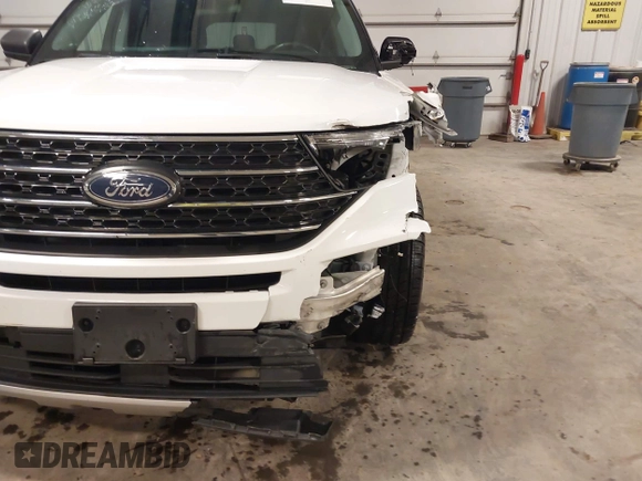 2022 Ford Explorer XLT z VIN 1FMSK8DH4NGB05636, wystawiony jako IAAI lot #42211545 z przebiegiem 55 366 mil mil oraz . Historia ofert i sprzedaży dostępna na DreamBid. Obrazek 6.