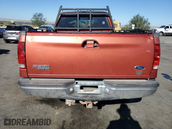 2000 Ford F-350 XL with VIN 1FTSW31FXYEB58081, listed as a Copart auction lot 72017584 with 220,066 mi miles and Salvage Title. Bid and sale history available at DreamBid. Image 6.