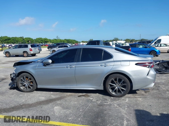 2023 Toyota Camry SE z VIN 4T1G11AK9PU805365, wystawiony jako IAAI lot #40647197 z przebiegiem 18 643 mil mil oraz . Historia ofert i sprzedaży dostępna na DreamBid. Obrazek 15.