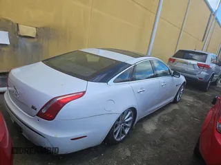 2013 Jaguar XJ с VIN SAJWJ1CD7D8V49599, выставлен на аукционе Copart как лот 82354574 с пробегом 133 163 миль миль и Чистый • Clean title. История ставок и продаж доступна на DreamBid. Изображение 4.