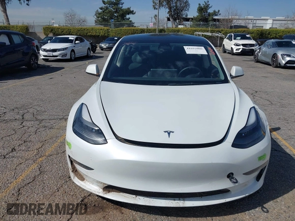 2023 Tesla Model 3 with VIN 5YJ3E1EA8PF398110, listed as a IAAI auction lot 41692006 with 112,699 mi miles and . Bid and sale history available at carsss.com. Image 12.